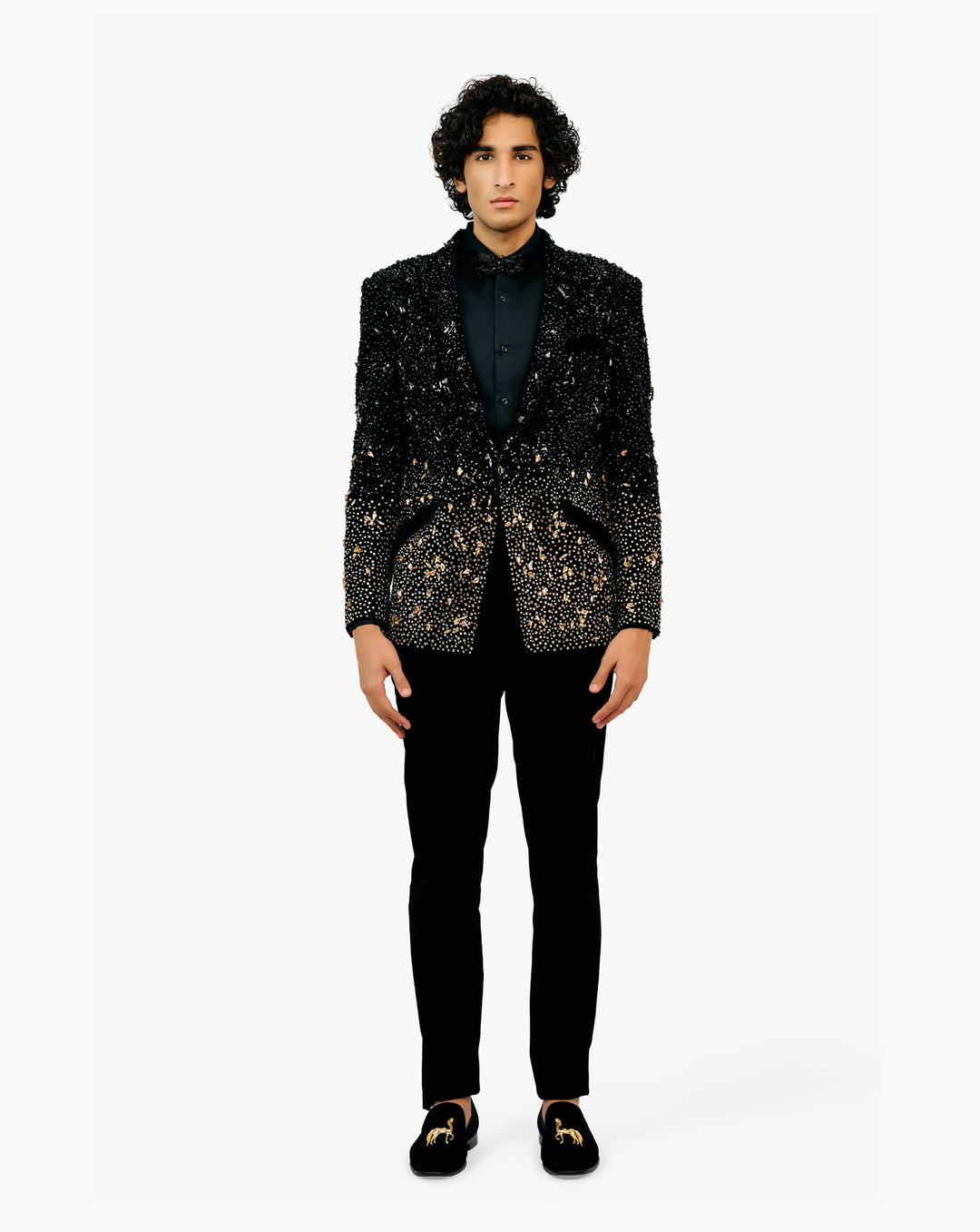 Model wearing black embroidered suit set by Gaurav Gupta