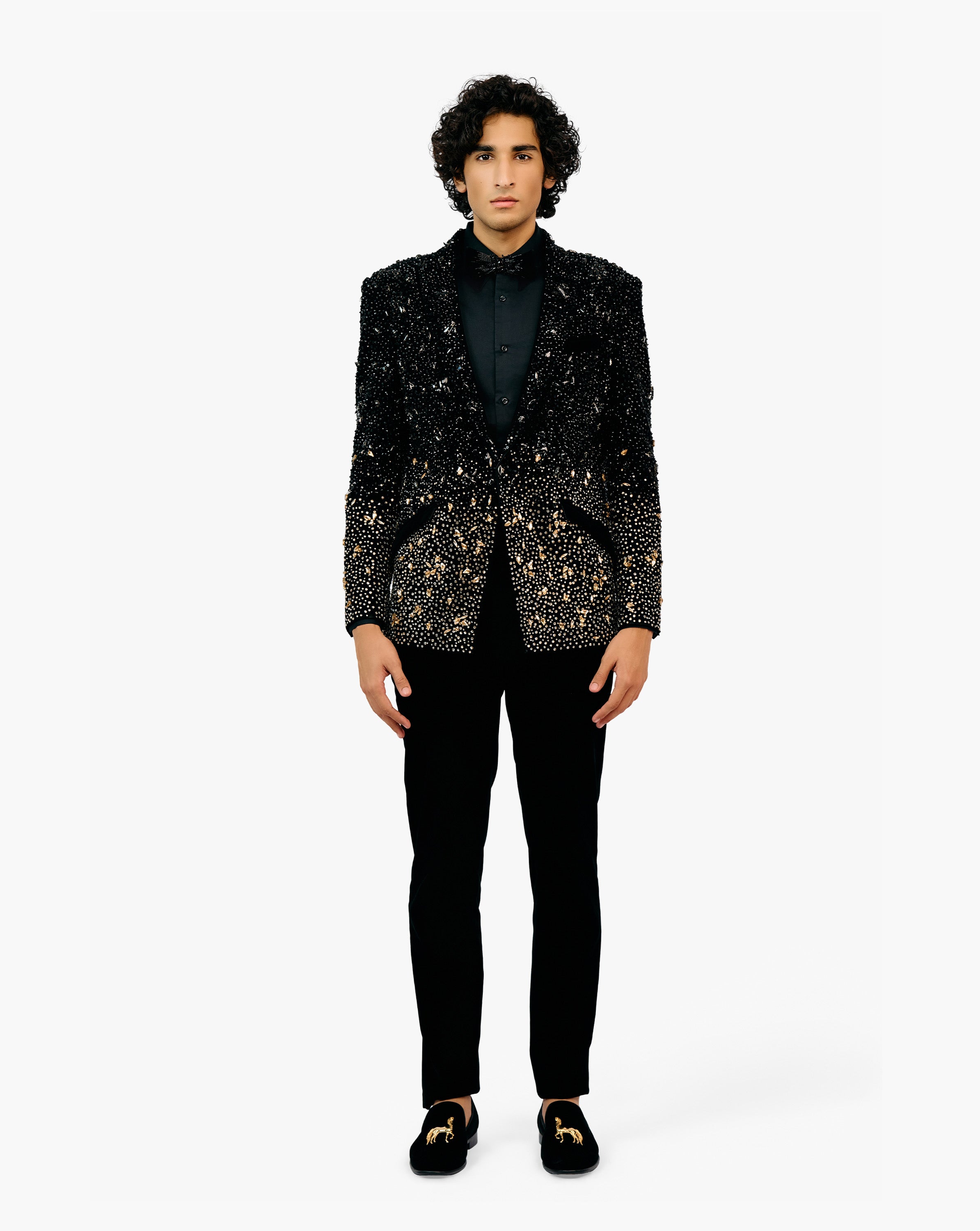 Model wearing black embroidered suit set by Gaurav Gupta