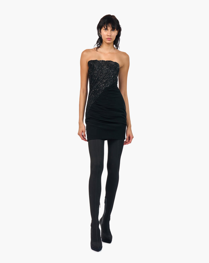 Model wearing black glittery outfit by Gaurav Gupta